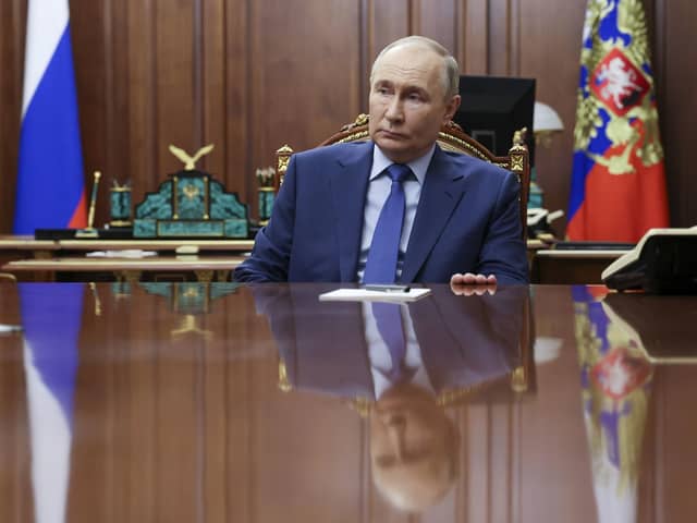 Russian president Vladimir Putin listens to speaker of the State Duma at the Kremlin in Moscow, Russia. Picture: Alexander Kazakov, Sputnik, Kremlin Pool Photo via AP