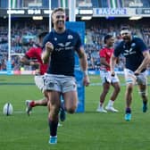Kyle Steyn celebrates his fourth try and Scotland's tenth during the 60-14 Autumn Nations Series win over Tonga. (Photo by Ross MacDonald / SNS Group)