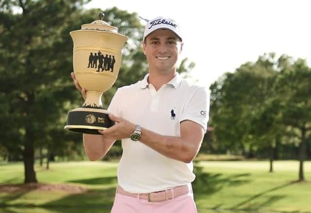 Justin Thomas shows off the WGC FedEx St Jude Invitational trophy after claiming his second win in the event. Picture: Getty Images