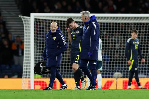 Scotland captain Andy Robertson eaves the field after suffering an injury during the international friendly match against Northern Ireland. (Photo by Ian MacNicol/Getty Images)