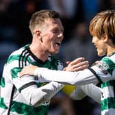 Celtic captain Callum McGregor celebrates with Kyogo Furuhashi after the 1-0 win over Rangers at Ibrox. (Photo by Alan Harvey / SNS Group)