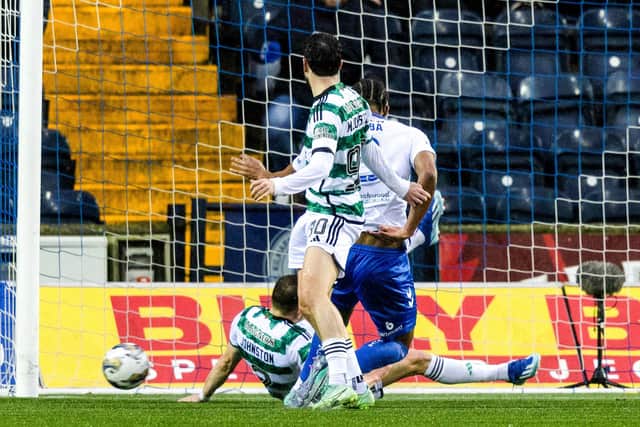 Celtic's Alistair Johnston makes a block on the line to deny Kilmarnock's Corrie Ndaba.