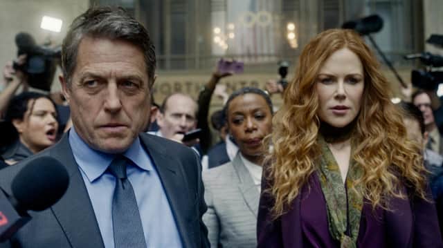 Hugh Grant and Nicole Kidman arrive at court for the start of the murder trial in The Undoing.