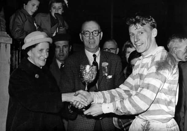 Ken Scotland receives the Melrose trophy on behalf of 1960’s Cambridge University invitation side