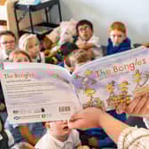 A Our Lady's RC Primary School teacher reading The Bongles and The Crafty Crows.  Photo: Abertay University/PA Wire