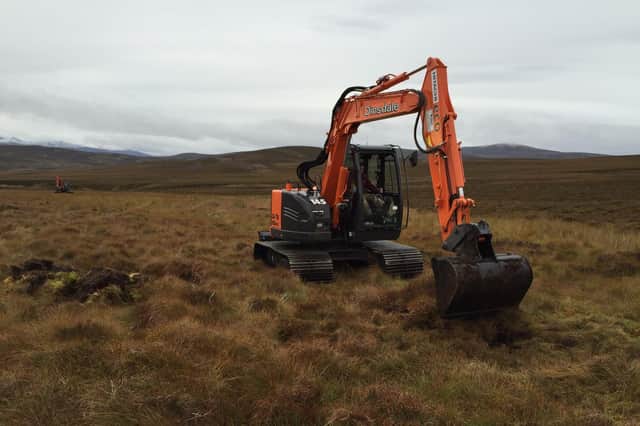 Peatland restoration work, like this on the Invercauld estate, often requires heavy machinery