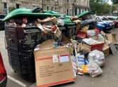 Rubbish has been piling up in streets around Edinburgh since the strike action began.
