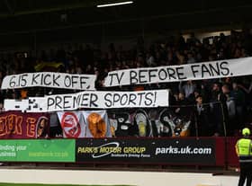 Motherwell fans unveil a protest banner aimed at a kick-off time for their Premier Sports Cup quarter-final.  (Photo by Ross MacDonald / SNS Group)