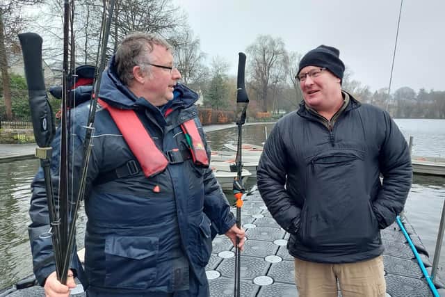 Bryan Chalmers, editor of Esox Scotland, the pike fishing magazine, and Alan Tennant, right, chairman Forth Area Federation of Anglers, on the pontoon at Linlithgow. Picture: Nigel Duncan