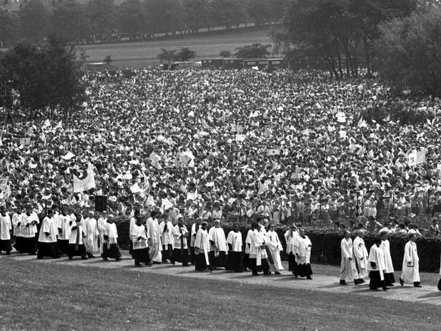 A welcoming crowd wait to see Pope John Paul II at Bellahouston Park, in Glasgow.