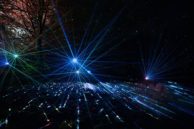 The immersive Laser Lights shoot colourful beams through theatrical fog effects.