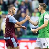 Hibs defender Paul Hanlon and Aston Villa midfielder John McGinn at full-time following the first leg at Easter Road. (Photo by Ross Parker / SNS Group)