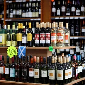 File photo dated 01/05/18 of alcohol for sale in an Edinburgh off-licence. Minimum unit pricing (MUP) for alcohol has been linked to a 13% drop in deaths from alcohol consumption, according to a study. The research, published in The Lancet, suggests 156 deaths per year on average in Scotland may have been prevented due to the pricing policy, which was implemented in May 2018. Issue date: Tuesday March 21, 2023.