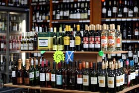 File photo dated 01/05/18 of alcohol for sale in an Edinburgh off-licence. Minimum unit pricing (MUP) for alcohol has been linked to a 13% drop in deaths from alcohol consumption, according to a study. The research, published in The Lancet, suggests 156 deaths per year on average in Scotland may have been prevented due to the pricing policy, which was implemented in May 2018. Issue date: Tuesday March 21, 2023.