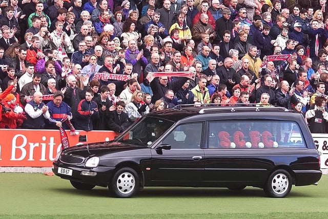 The hearse containing the body of Sir Stanley Matthews passes by crowds at the formerly named Brittania Stadium.