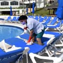 Which? is urging those considering a package holiday this summer to read the small print before booking. Picture: Elizabeth Ruiz/AFP via Getty Images.