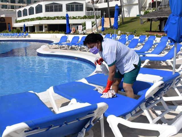 Which? is urging those considering a package holiday this summer to read the small print before booking. Picture: Elizabeth Ruiz/AFP via Getty Images.