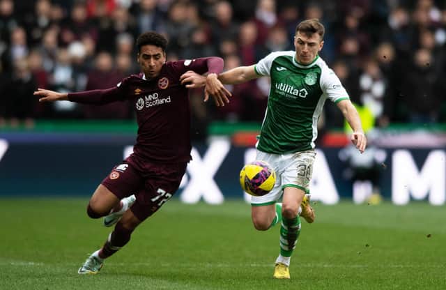James Hill and Josh Campbell vie for possession during the last derby match between Hibs and Hearts at Easter Road.
