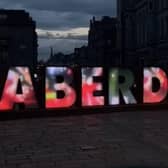 The Aberdeen sign in the city was lit up with images of the famous night in Gothenburg.