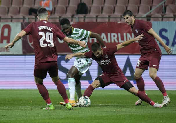 Celtic's goalscorer Odsonne Edouard, in early action as he duels for the ball with Sarajevo's Mersudin Ahmetovic, second right, during the Scottish champions Europa League play-off win in Zenica's Bilino polje stadium. (AP Photo/Kemal Softic)