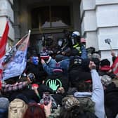 Trump supporters, fuelled by his spurious claims of voter fraud, invaded the US Capitol. (Picture: Brendan Smialowski/AFP via Getty Images)