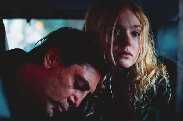 Javier Bardem and Elle Fanning in The Roads Not Taken