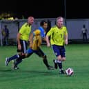 Craig Meikle, main left with Davie Taylor, right, playing for Scotland against hosts Thailand