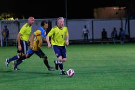 Craig Meikle, main left with Davie Taylor, right, playing for Scotland against hosts Thailand