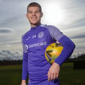 Chris Mueller has shared copies of his book with his Hibs teammates.  (Photo by Bruce White / SNS Group)