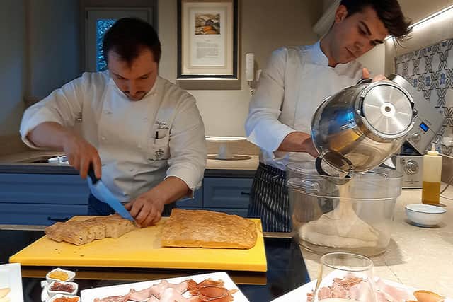 Chef Stefano Barrillo (left) leads a cookery demonstration at Villa La Massa, Florence, Tuscany. Pic: PA Photo/Katie Wright.