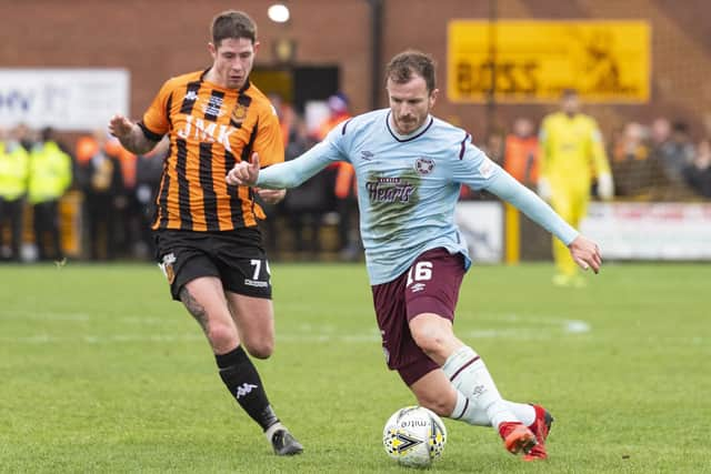 Andy Halliday and Gareth Armstrong in action during the Scottish Cup 4th round on January 22, 2022.  (Photo by Mark Scates / SNS Group)