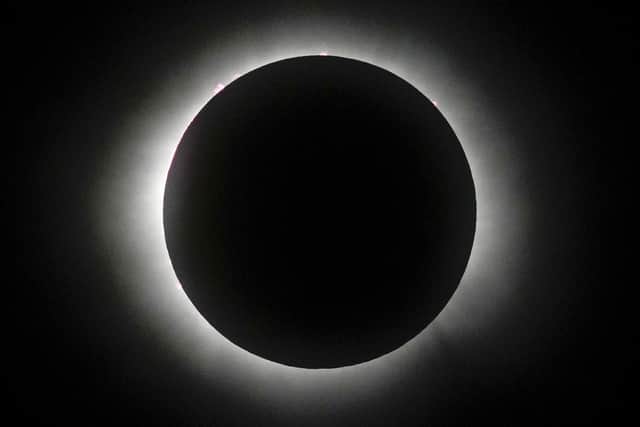 The moon covers the sun during a total solar eclipse in Mazatlan, Mexico, Monday, April 8, 2024. (AP Photo/Fernando Llano)