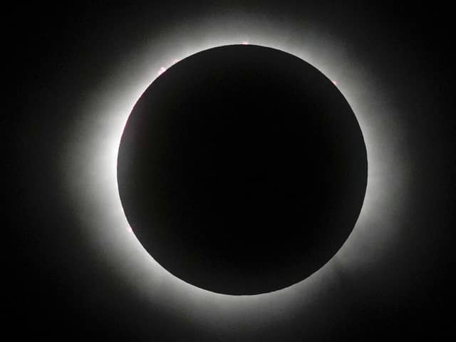The moon covers the sun during a total solar eclipse in Mazatlan, Mexico, Monday, April 8, 2024. (AP Photo/Fernando Llano)