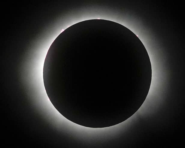 The moon covers the sun during a total solar eclipse in Mazatlan, Mexico, Monday, April 8, 2024. (AP Photo/Fernando Llano)