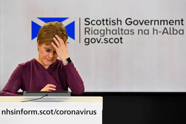 Scotland's First Minister Nicola Sturgeon holds one of her daily briefings. (Photo by Andy Buchanan - WPA POOL/Getty Images)
