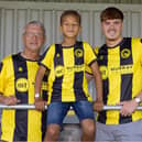Iconic: The new shirt modelled by figures from all eras of the club (l-r): goalkeeper Richie Konczak from the title-winning side, Theo Chemonges-Murzynowski, representing the future through the Nairn County Community Football Programme and current striker Ben Barron.