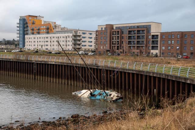 The 40ft Runagate, once owned by novelist Nevil Shute, lies in West Harbour, Granton, after being battered by Storm Arwen. .PIC: Andy O'Brien/JPIMedia.