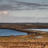 The vast barrier which connects South Ronaldsay and Burray to the Orkney mainland is regularly closed due to wave overtopping. Picture: Orkney.com