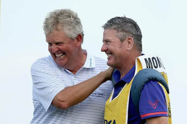 Colin Montgomerie celebrates with his caddie Alastair McLean after winning a second successive Senior PGA Championship Presented By KitchenAid at the Pete Dye Course at the French Lick Resort, Indiana, in 2015. Picture: Andy Lyons/Getty Images.