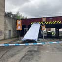 The roof of the double-decker bus was sliced off after the vehicle collided with the low bridge. Picture: Network Rail