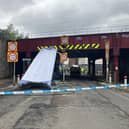 The roof of the double-decker bus was sliced off after the vehicle collided with the low bridge. Picture: Network Rail