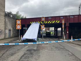 The roof of the double-decker bus was sliced off after the vehicle collided with the low bridge. Picture: Network Rail