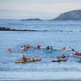 Volunteers from Lothian Sea Kayak Club paddle towards Lamb Island to track down its invading vermin