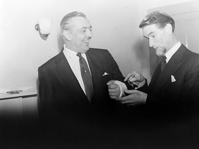 Duncan Macrae and French actor, mime and filmmaker Jacques Tati at a reception at the Edinburgh Film House in 1955.