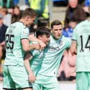 Hibs celebrate a rare goal from Lewis Stevenson to earn them a point against St Johnstone.