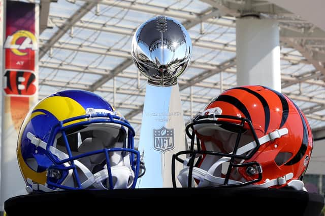 Helmets of the Los Angeles Rams and Cincinnati Bengals sit in front of the Lombardi Trophy as NFL Commissioner Roger Goodell (not pictured) addresses the media at the NFL Network's Champions Field at the NFL Media Building on the SoFi Stadium campus in Inglewood, California. (Photo by Rob Carr/Getty Images)