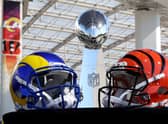 Helmets of the Los Angeles Rams and Cincinnati Bengals sit in front of the Lombardi Trophy as NFL Commissioner Roger Goodell (not pictured) addresses the media at the NFL Network's Champions Field at the NFL Media Building on the SoFi Stadium campus in Inglewood, California. (Photo by Rob Carr/Getty Images)