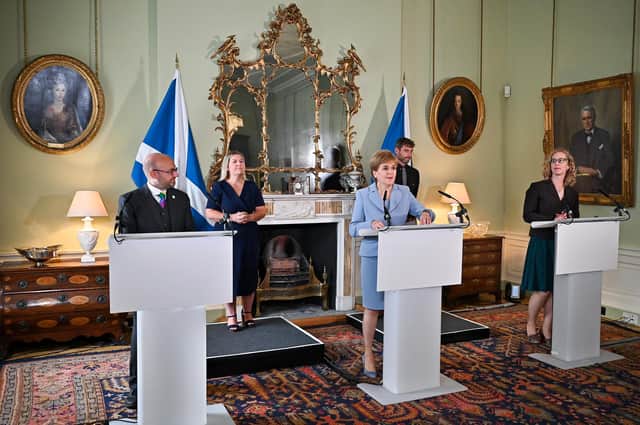 Nicola Sturgeon holds a media briefing with Scottish Greens co-leaders Patrick Harvie and Lorna Slater at Bute House after they agreed a power-sharing partnership (Picture: Jeff J Mitchell/pool/Getty Images)