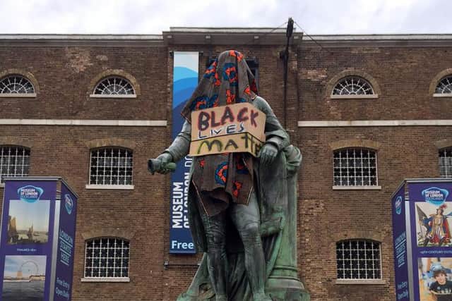 A statue of the prominent Scottish slave trader, Robert Milligan, has been removed from outside a museum in London’s old docklands.