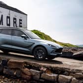 The DBX Bowmore Edition pictured at the Bowmore Distillery on Islay. Only 18 of the model, styled by Aston Martin's Q by Aston MArtin personalisation service will be released.